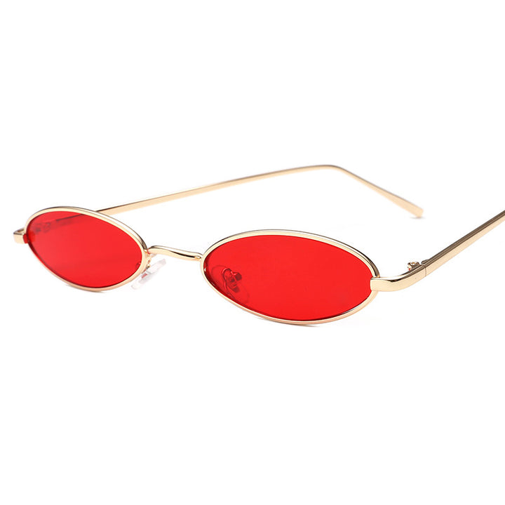Dame elegant solbrille i oval metallramme Skanto