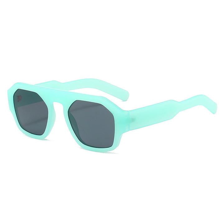 Dame motetrender solbrille i innovativ geometrisk design Skanto