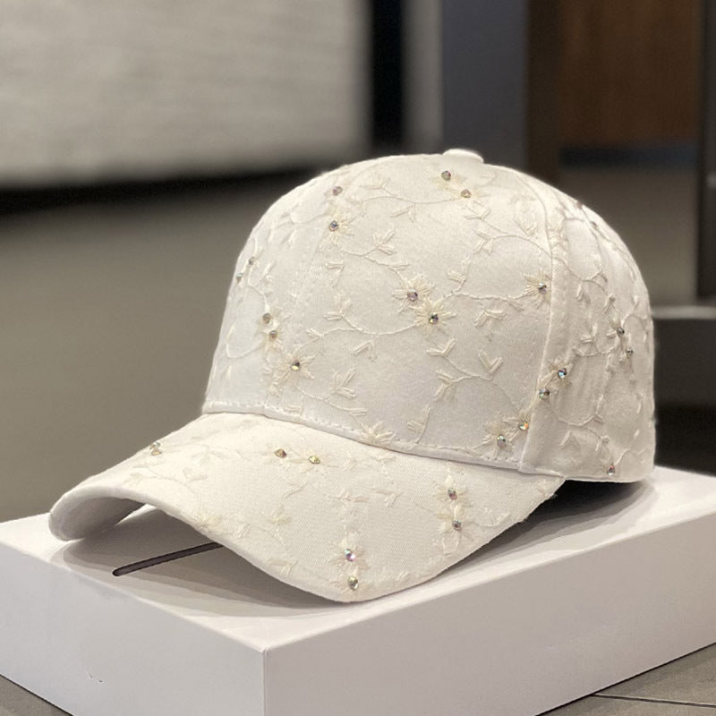 Kvinne pyntet blomster caps Skanto