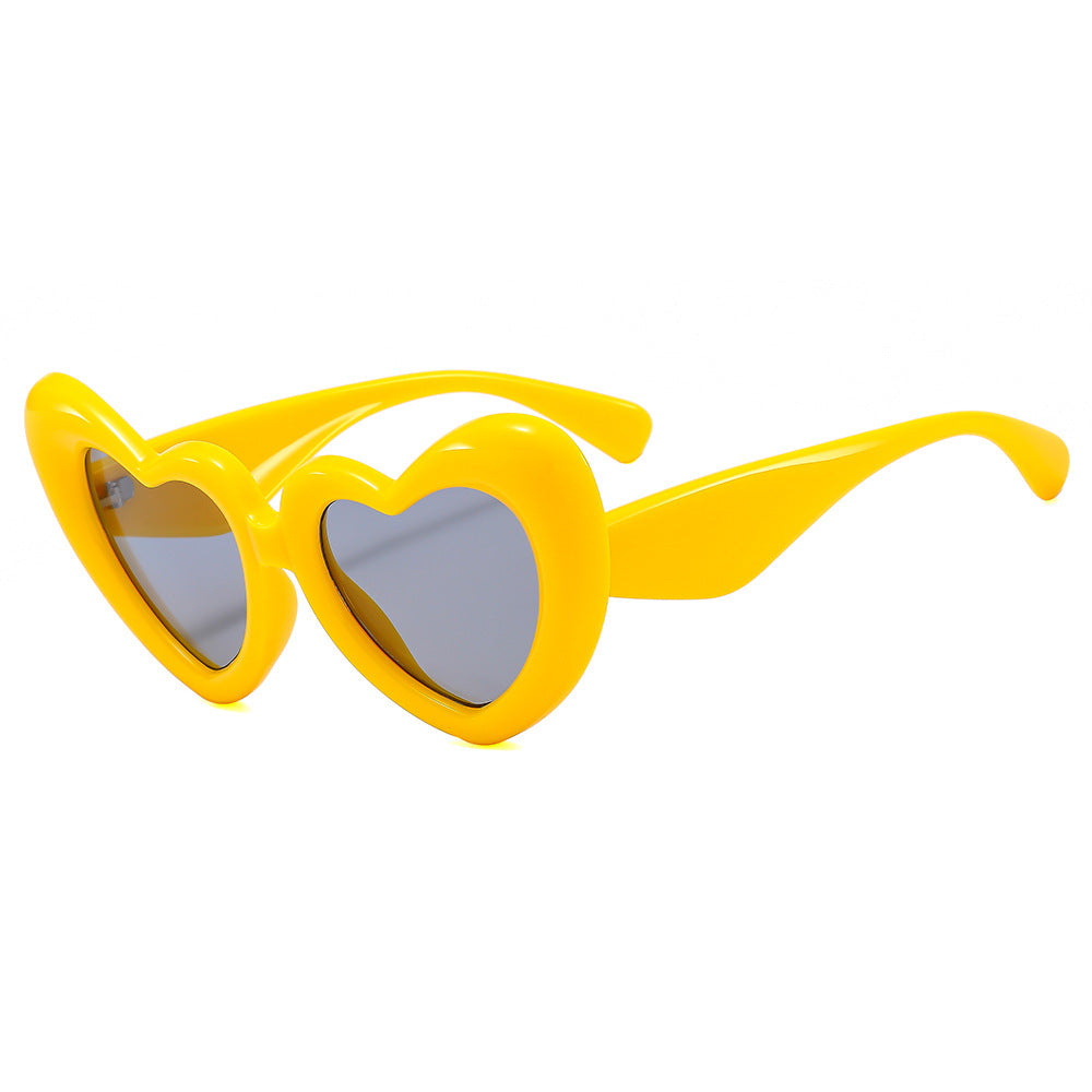 Dame Hjerteformet Solbrille med stilfull innramming Skanto