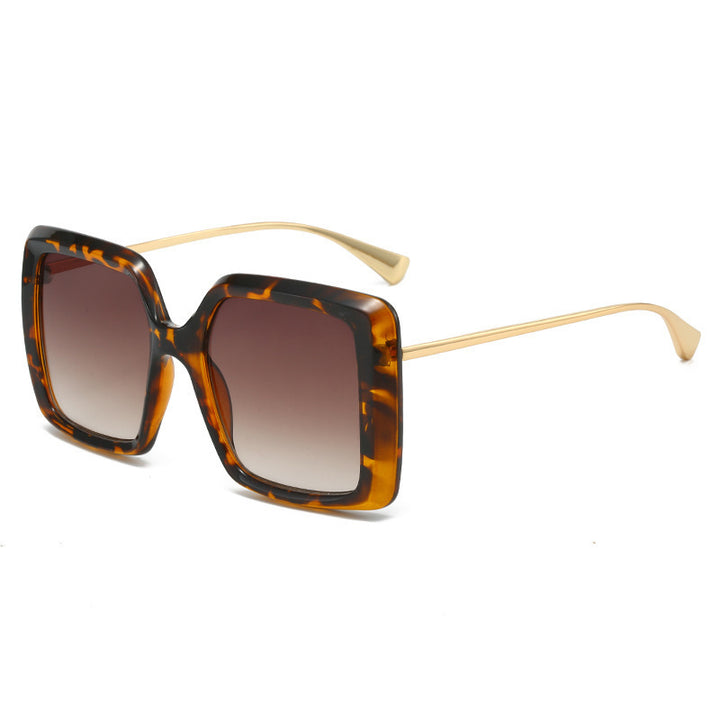 Dame oversized solbriller med stilrent geometrisk design Skanto