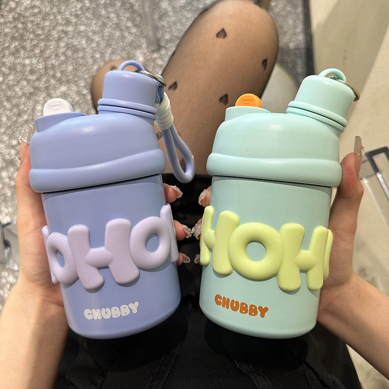 Damen isolierte Wasserflasche mit ergonomischem Tragegriff und fröhlichem Motiv Skanto