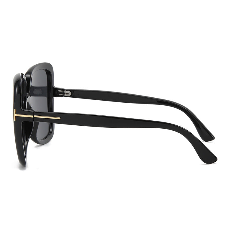 Dame elegant oversized solbrille med filigranramme Skanto