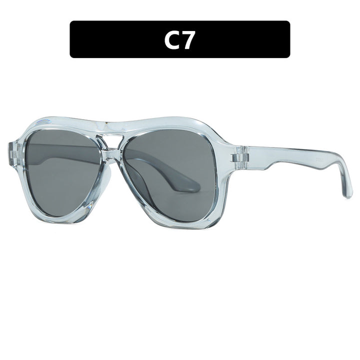 Dame moterik solbrille i innovativ design med bred ramme Skanto