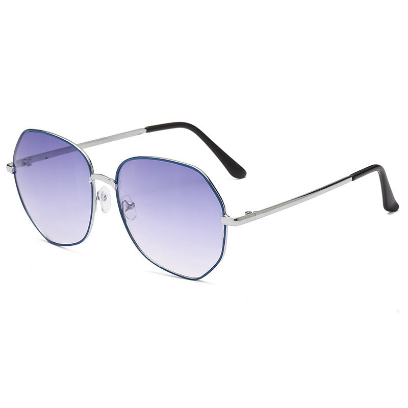 Damer moteriktig solbrille med åttekantet form og polarisert glass Skanto