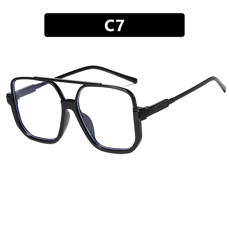 Dame kvadratisk solbrille med gjennomsiktig ramme og grønntonet glass Skanto