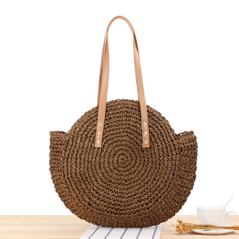 Round straw bag with leather handle Skanto