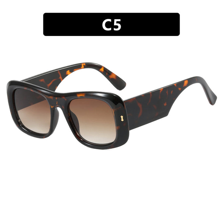 Damen kvadratisk solbrille med refleksjonsbeskyttende linser og moderne ramme konstruksjon Skanto