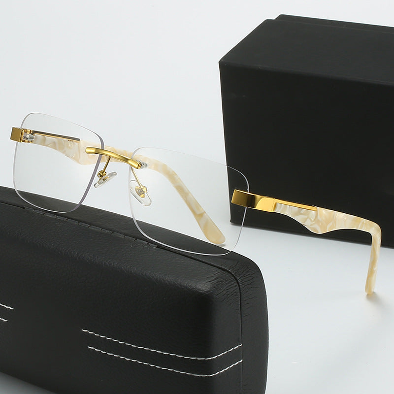 Dame moteriktig halvrammebrille med elegant metall- og plastmix Skanto