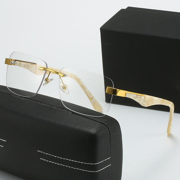 Dame moteriktig halvrammebrille med elegant metall- og plastmix Skanto