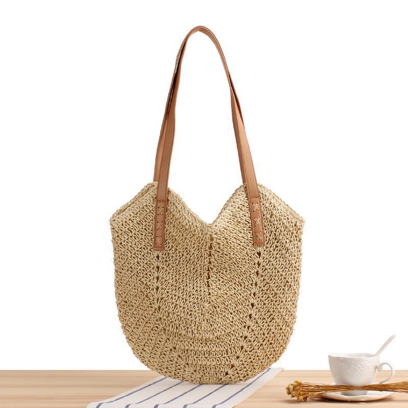 Large straw bag with leather accents Skanto