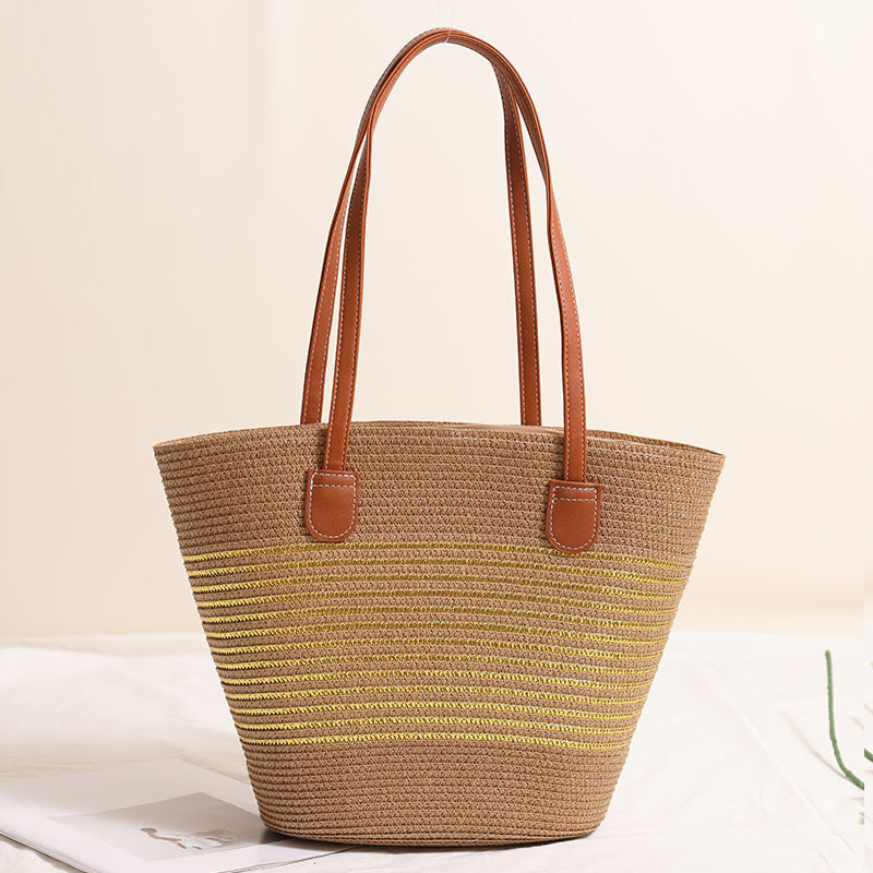 Elegant Bastbag med skinnaksenter Skanto