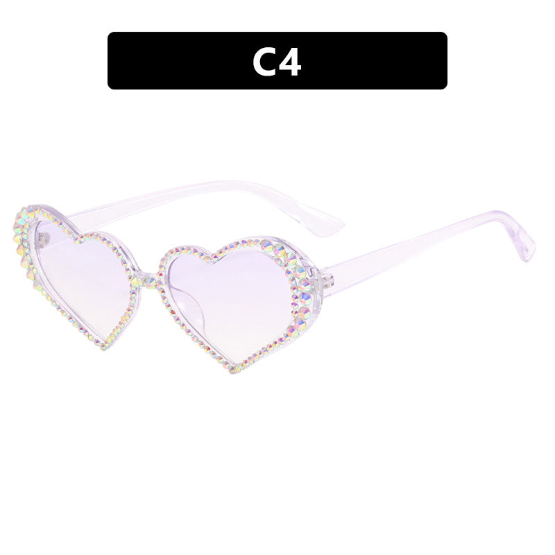 Dame hjerteformet solbrille med strassbesatt ramme Skanto