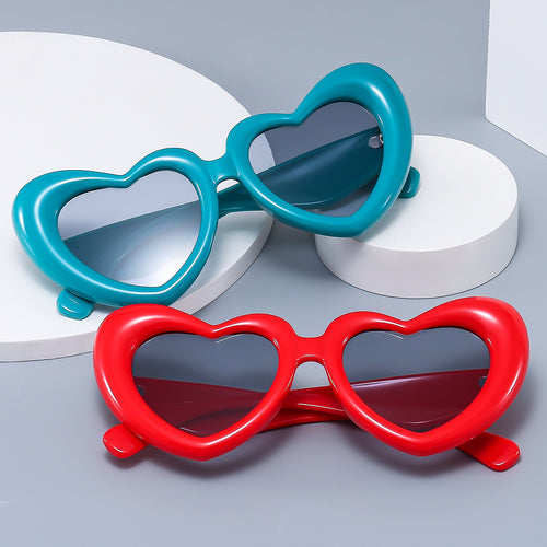 Dame Hjerteformet Solbrille med stilfull innramming Skanto