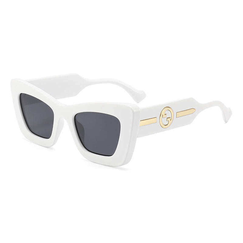 Dame designer solbrille med markant geometrisk ramme og høy kvalitet utførelse Skanto
