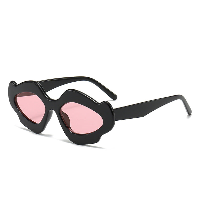 Dame moteriktig solbrille med unik blomsterramme Skanto