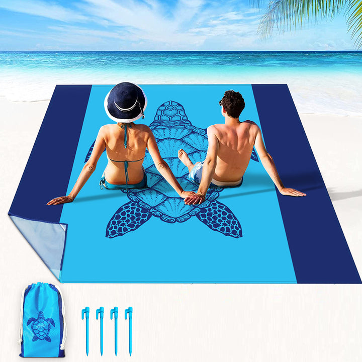 multifunksjonelt strandhåndkle med kreativt skilpadde-motiv Skanto
