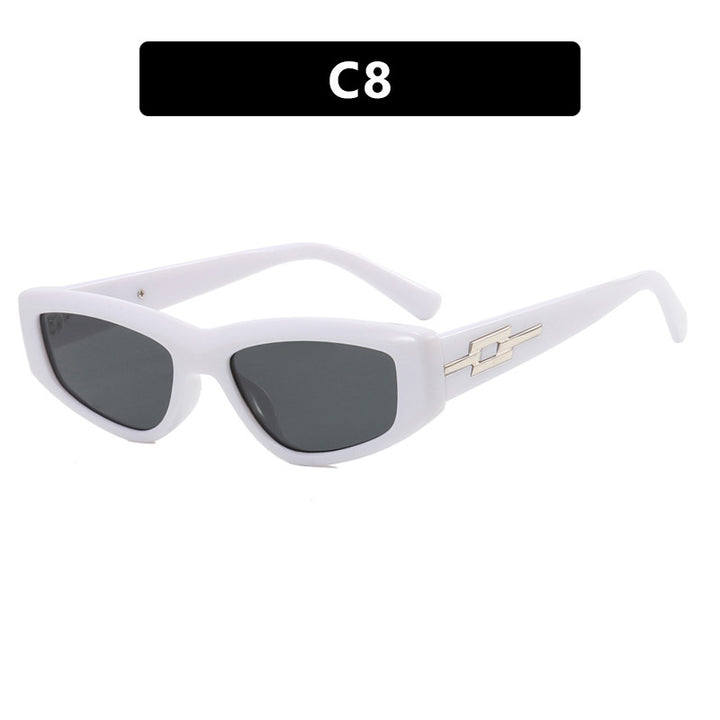 Dame moteriktig Cat-Eye solbrille med transparent ramme og kule glass Skanto