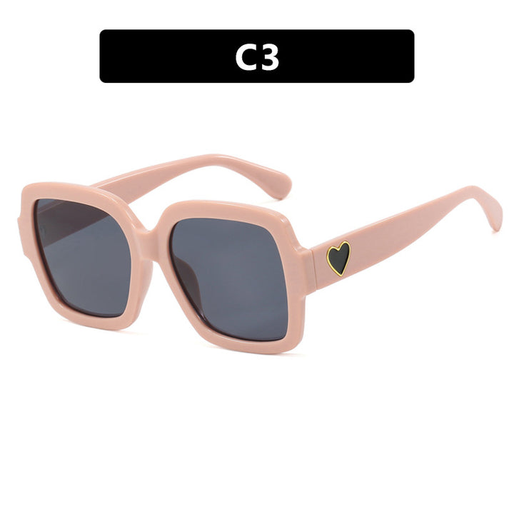 Dame firkantet solbrille med leken hjerte detalj Skanto