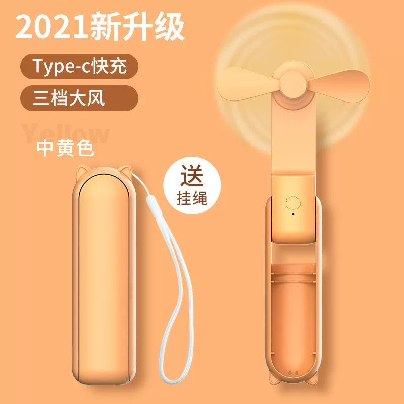 Unisex en størrelse sammenleggbar oppladbar trippel håndholdt mini vifte med innebygd powerbank USB-C og USB-A tilkoblinger samt håndleddsstropp Skanto
