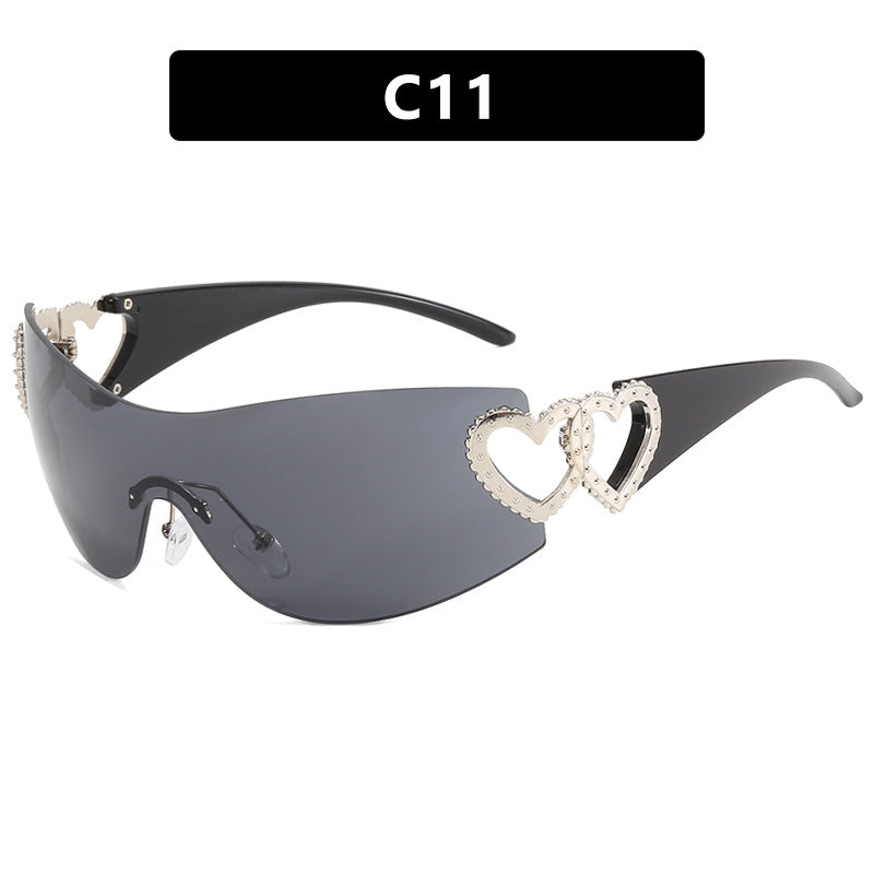Dame Fashion-solbrille med hjerte-applikasjoner Skanto