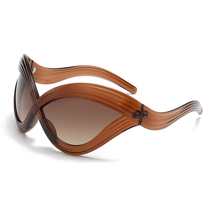 Dame ekstraordinær solbrille med buet design Skanto