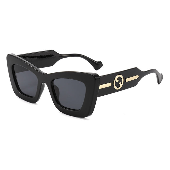 Dame designer solbrille med markant geometrisk ramme og høy kvalitet utførelse Skanto