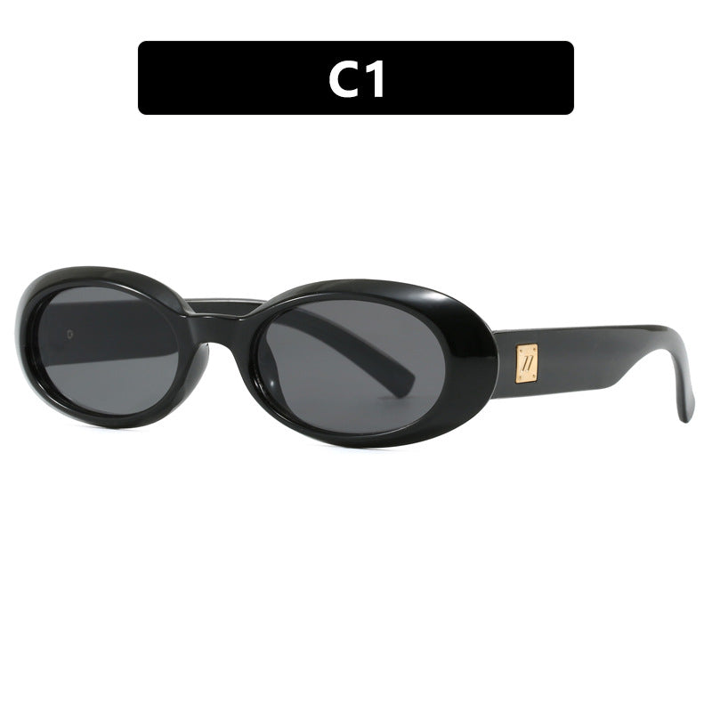 Dame eksklusiv solbrille i elegant ovalt design Skanto