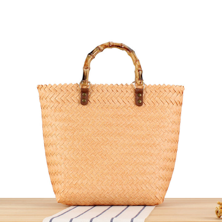 Handbag made of high-quality, braided material with bamboo handle Skanto