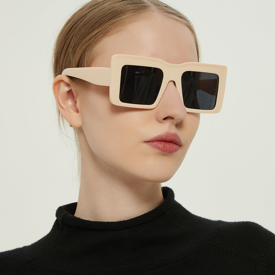 Dame firkantet solbrille med gjennomsiktig ramme og UV-beskyttelse Skanto