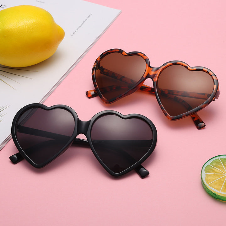 Dame hjerteformet solbrille med stilige rammer Skanto
