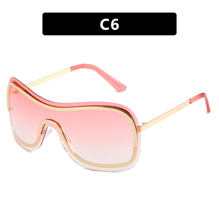Dame stor rund solbrille med elegant metallramme Skanto