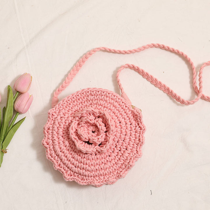 Håndheklede crossover-veske med florale detaljer Skanto