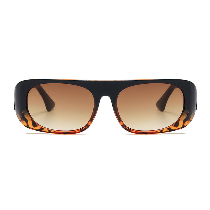 Dame moteriktig solbrille i elegant skjolddesign Skanto