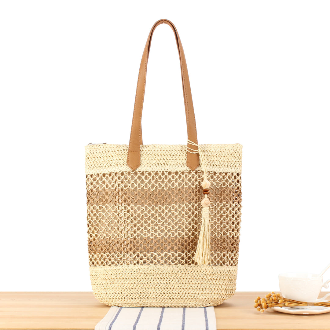 Handbag made of natural woven material with elegant leather straps Skanto