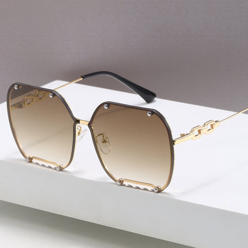 Dame elegant sekskantet designer-solbrille med luksuriøse aksenter Skanto