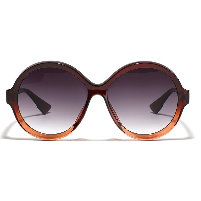 Dame oversized moteriktig solbrille med unik rammeform Skanto