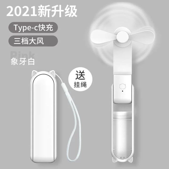 Unisex en størrelse sammenleggbar oppladbar trippel håndholdt mini vifte med innebygd powerbank USB-C og USB-A tilkoblinger samt håndleddsstropp Skanto