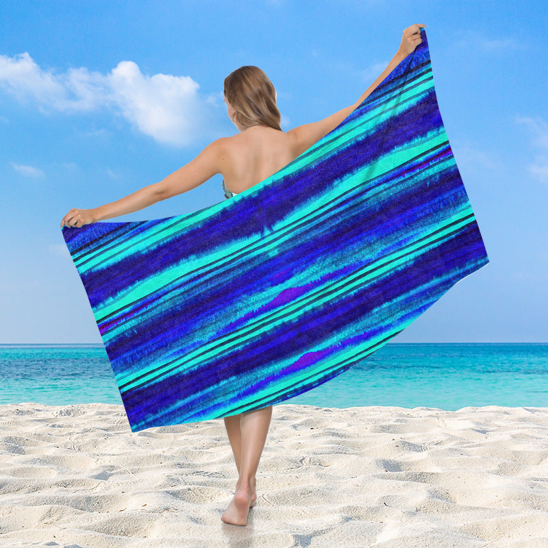 Women's beach towel with vibrant palm motif Skanto
