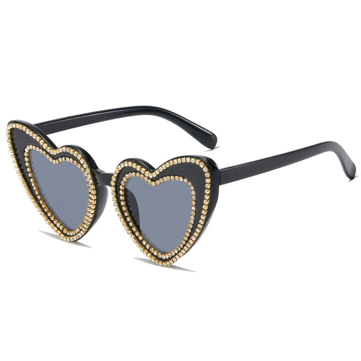 Dame hjerteformet solbrille med glitrende detaljer Skanto