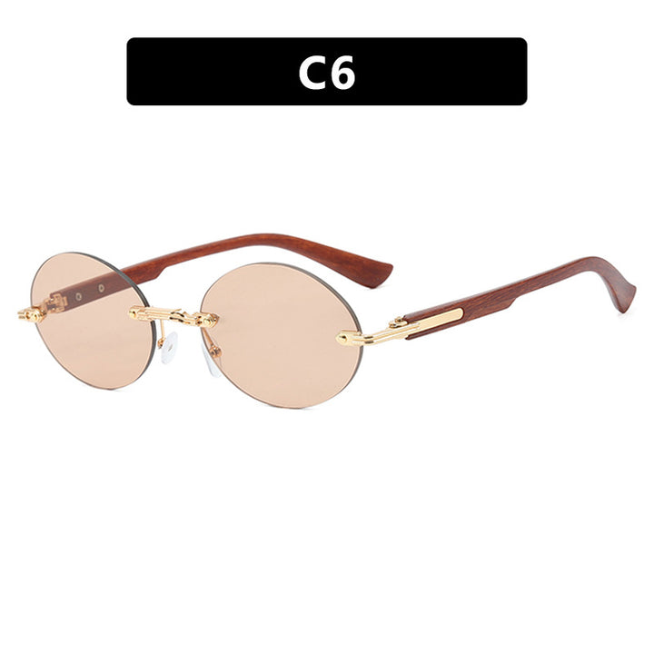 Dame rund solbrille med elegant treinnramme og UV-beskyttelse Skanto