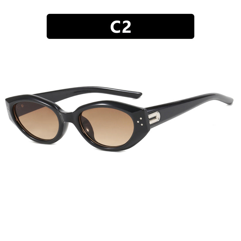 Dame Cat-Eye solbrille med aksentuerte transparente ramme og UV-beskyttelse Skanto