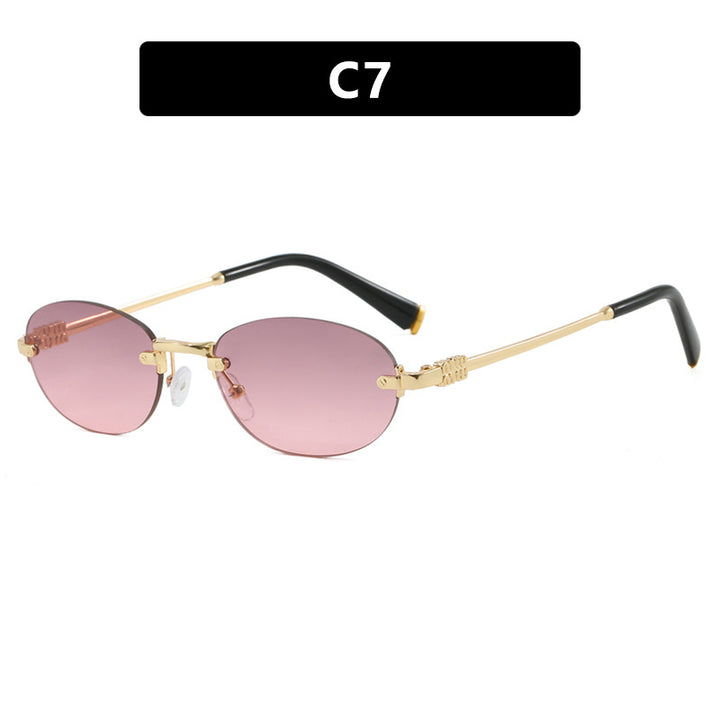 Dame moterimessig solbrille med oval ramme og elegante aksenter Skanto