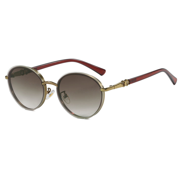 Dame elegant rund solbrille med speilende effekt Skanto
