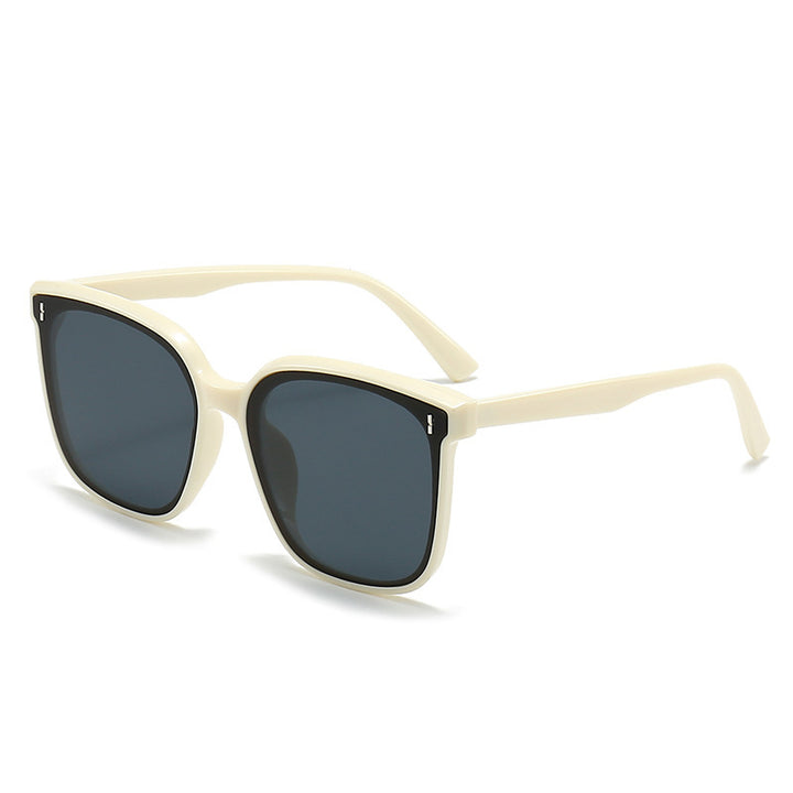 Dame Motekom solbrille med beskyttende UV-filter og elegant design Skanto