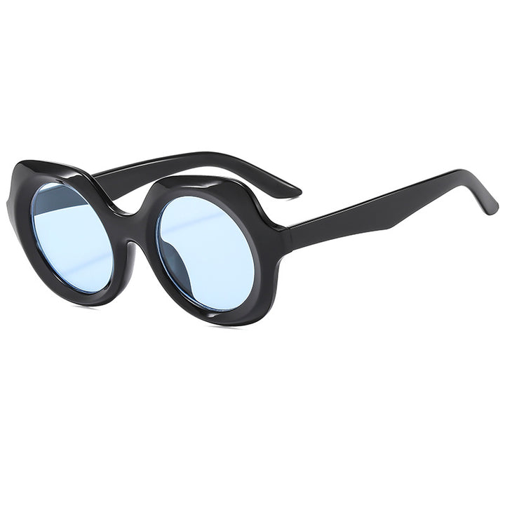 Dame oversized solbriller med stilige, buede rammer Skanto
