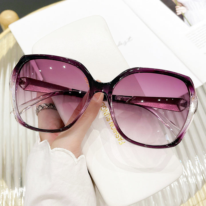 Dames store solbriller i elegant sommerfugl design Skanto