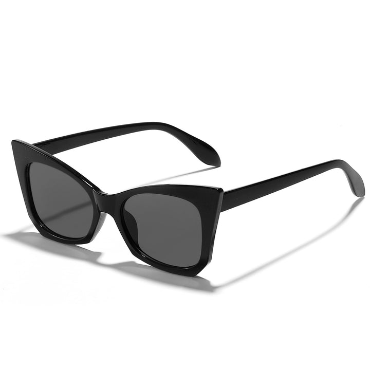 Dame solbrille i trendy katteøye-design med iøynefallende leopardmønster Skanto