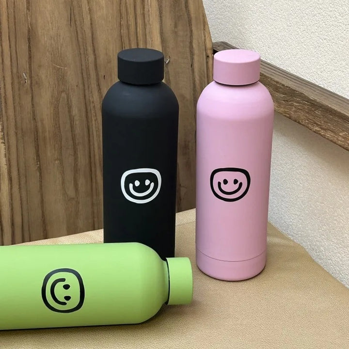 Dame-isoleringsflaske med kreativt Smiley-design Skanto
