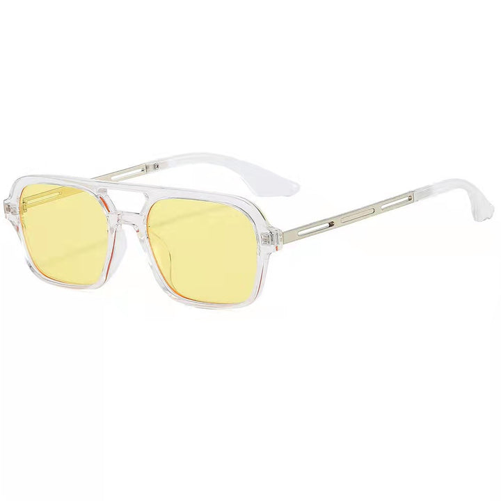 Dame designer solbriller med elegant transparent ramme og gule glass Skanto